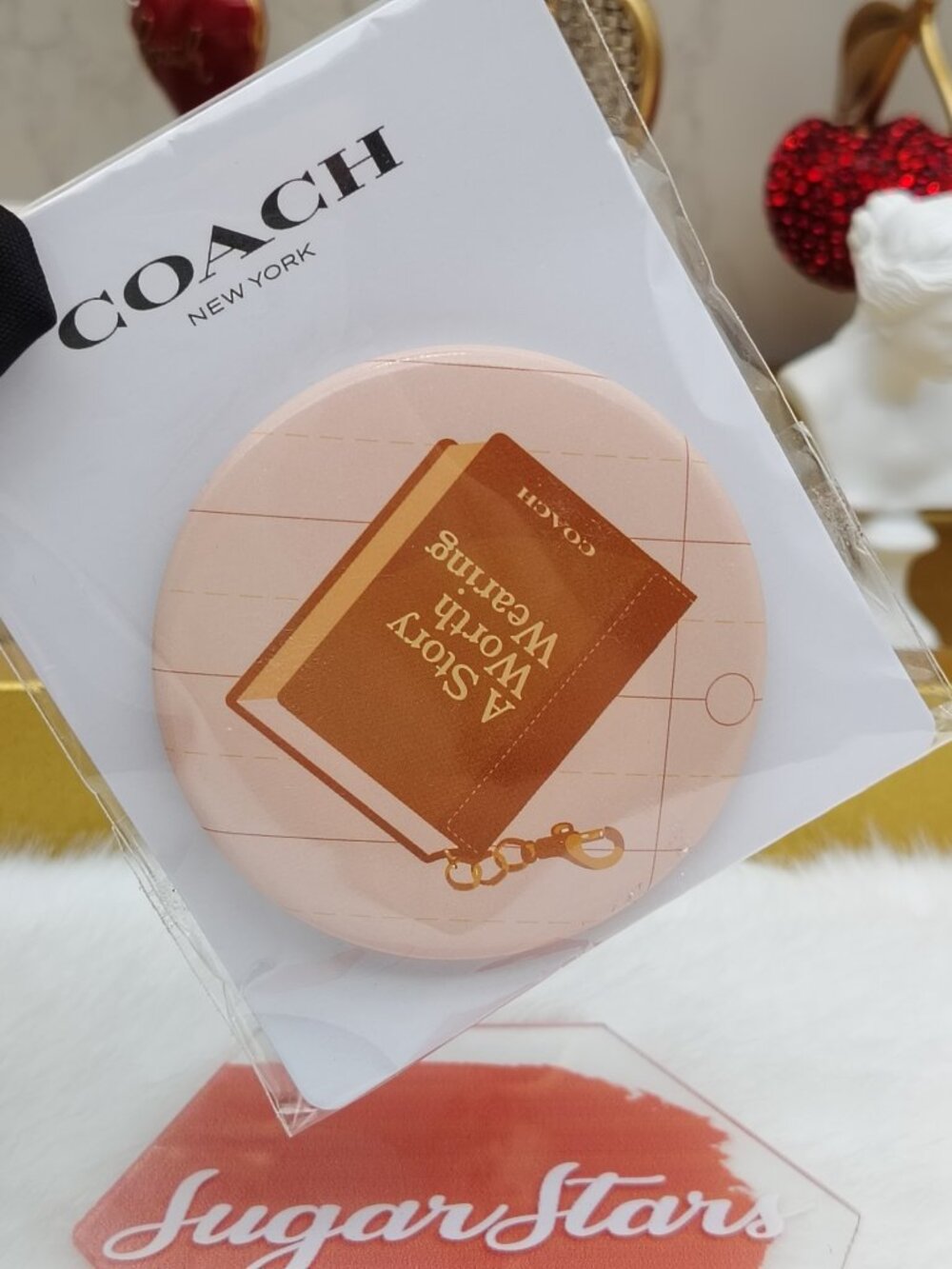 Coach brooch